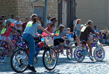 Kids on decorated bikes